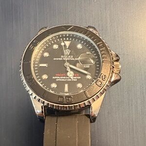 Rolex Black Dial Watch with Silver Accents